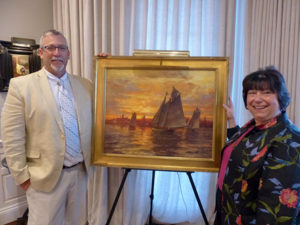 Rockport artist Ken Knowles with Care Dimensions President Pat Ahern and the painting Ken is donating to Care Dimensions 40th Anniversary Gala